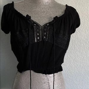 Black top, never worn, no tags